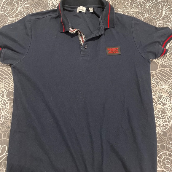 Burberry polo size L fits like M
